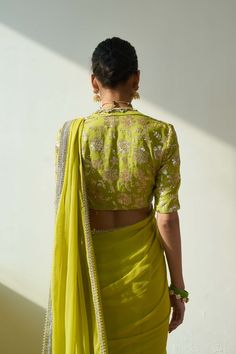 Introducing the mesmerizing soraya sari and blouse set, fashioned from luxurious georgette fabric in a captivating lime green hue. This ensemble comprises two stunning components, meticulously adorned with intricate embroidery including trims, cutwork, and delicate handwork. Elevate your allure with this ethereal ensemble, designed to captivate attention at any special occasion. Green Sari, Intricate Embroidery, Georgette Fabric, Cut Work, Green Fabric, Lime Green, Occasion Wear, Custom Sizing, Special Occasion