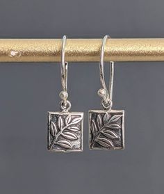 Leaf Oxidized Sterling Silver Earrings, Tiny Bali Silver Leaf Earrings,Delicate Flower Earrings, Dangle Earrings and would be great to wear everyday or even on special occasions.  Leaf measures: 11mm x 8mm Total Length: 23mm. * Processing time is 3 - 5 days.  * US orders are shipped first class mail. * International orders are shipped first class international. * Shipping upgrades are available at checkout. Thank you for visiting my listing! Have a wonderful day! Single Silver Rectangular Earring, Nickel Free Rectangular Pendant Earrings As Gift, Fern Earrings, Flower Earrings Dangle, Indie Jewelry, Bali Silver, Jewelry Accessories Ideas, Dope Jewelry, Funky Jewelry