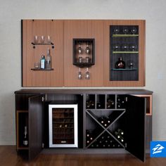 a wine cabinet with several bottles and glasses in it