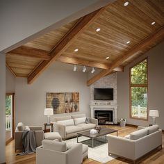 a living room filled with furniture and a flat screen tv mounted on the wall above a fireplace