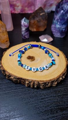 This bracelet was made to honor our favorite grandpa, meow meow, Sir Min Yoongi from BTS! Or as we all know him, Suga. Color pallette inspired by BTS's BE album lyric book. Can be worn on wrist by itself or stacked with other bracelets. Materials: Turquoise crystal chips Lapis lazuli crystal chips Assorted glass beads Nylon cord ~Army Spirit~ Yoongi Bracelet, Agust D Concert, Lyric Book, Lapis Lazuli Crystal, Crystal Chips, Turquoise Crystal, Min Yoongi Bts, Bts Yoongi, Meow Meow