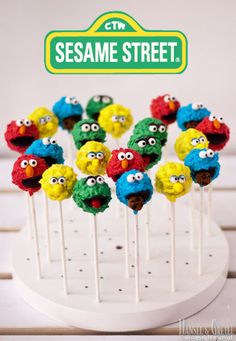 sesame street lollipops are on a stick