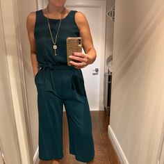 This Jumpsuit Is So Versatile. Dress Up Or Down W/Flats, Heels, Boots Or Sneakers. Wear A Chic Long Blazer On Top For An Instant Upgraded Look!!Color Is A Teal/Green. Green Tie Waist Jumpsuit For Work, Chic Sleeveless Jumpsuits And Rompers With Tie Waist, Sleeveless Green Jumpsuits And Rompers For Work, Elegant Sleeveless Tie Waist Jumpsuits And Rompers, Sleeveless Workwear Jumpsuit With Tie Waist, White Denim Jumpsuit, Oversized Jumpsuit, Animal Print Jumpsuit, Zara Floral Dress