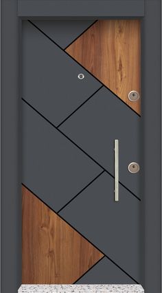 a modern door with wood paneling and metal handles