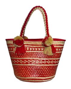 Wayuu handmade straw bag perfect for a day at the beach or touring on your vacation Palm Leaf Basket Bag, Handmade Red Bucket Bag For Summer, Palm Leaf Bucket Bag For Market, Traditional Straw Tote Bag For Everyday Use, Red Handmade Bucket Bag For Beach, Handwoven Palm Leaf Beach Bag For Travel, Traditional Tote Bag With Braided Handles, Artisan Weaving Straw Bag, Handwoven Palm Leaf Bag For Vacation