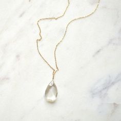 "A beautiful smoky quartz briolette hangs from a delicate gold filled cable chain. Available in 18\" or 24\" lengths. Each quartz is unique and varies in size from 15 x 5 mm to 17 x 8 mm. Some have a little smokier color to them while some are a little clearer so please allow for variations." Minimalist Briolette Crystal Necklace For Gift, Gold Faceted Drop Necklace, Formal Briolette Faceted Necklace, Dainty Briolette Faceted Crystal Necklace, Gold Faceted Briolette Drop Necklace, Faceted Briolette Crystal Necklace In Sterling Silver, Gold Faceted Briolette Crystal Necklace, Beachy Earrings, Briolette Necklace