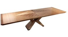 a wooden table with an interesting design on it's top and bottom, made out of wood