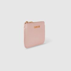 "Find GUCCI Zip Key Case With Script Leather on Editorialist. The Pre-Fall accessories spotlight essential silhouettes with emblematic details for day to evening. This zip key case, featuring an inside hook, appears in light pink leather and sports the Gucci script detail across the front in light gold-toned hardware. Light pink leather, Light gold-toned hardware, Taffeta lining, Gucci script detail, Inside hook, Zip closure, Weight: 0.14lbs approximately, 4.9\"W x 2.7\"H x 0.6\"D, Made in Italy" Classic Pink Compact Wallet, Classic Compact Pink Wallet, Elegant Pink Compact Coin Purse, Gucci Rectangular Bags With Card Slots, Pink Gucci Bag For Daily Use, Pink Compact Pouch, Elegant Pink Wallet With Zipper Pouch, Bat Mitzvah Party, Fall Accessories