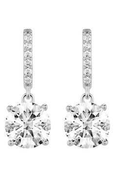 Brilliant lab-grown diamonds seem to hover just below an elegant line of additional stones on these stunning drop earrings rendered from 14-karat white gold. Total lab-grown-diamond weight: 2ct. or 4ct.   Color: G–J   Clarity: VS   14k gold/lab-grown diamond   Imported   >Diamond Guide Bridal Platinum Drop Earrings With Prong Setting, Platinum Bridal Drop Earrings With Prong Setting, White Gold Linear Drop Earrings With Brilliant Cut, White Diamond Linear Earrings With Prong Setting, Classic White Gold Linear Earrings With Prong Setting, White Brilliant Cut Drop Earrings, Classic White Gold Linear Earrings With Cubic Zirconia, Classic White Gold Cubic Zirconia Linear Earrings, Silver Classic Linear Earrings With Brilliant Cut