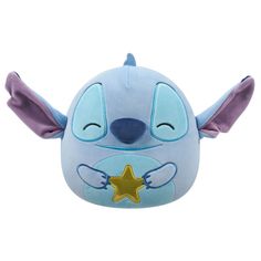 a blue stuffed animal with an orange star on it's chest and ears,