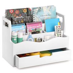 a white desk organizer filled with office supplies