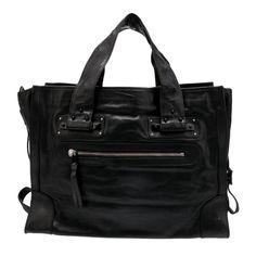 Chlo Tote Color: Black Leather Silver-Tone Hardware Dual Shoulder Straps Dual Exterior Pockets Canvas Lining & Single Interior Pocket Open Top Shoulder Strap Drop: 6.5" Height: 13.75" Width: 18.5" Depth: 7.75" Chloe Bags, Black Leather Tote Bag, Black Leather Tote, Chloe Bag, Leather Silver, Open Top, Leather Tote Bag, Womens Tote Bags, Leather Tote