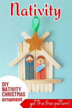 a nativity ornament made out of popsicle sticks with a star on top