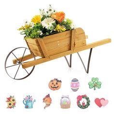 a wooden wheelbarrow filled with lots of flowers next to hearts and other decorations