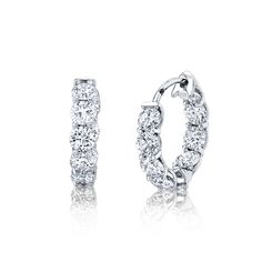 A jewelry box essential, these rounded diamond huggies are crafted in 18k white gold with that create the perfect amount of sparkle for day or night. Approximate Color HI, Clarity VS S Platinum Hoop Earrings With Brilliant Cut, Platinum Diamond Cut Hoop Earrings, Classic Platinum Hoop Earrings With Single Cut Diamonds, Formal Round Huggie Earrings With Single Cut Diamonds, Formal Brilliant Cut Huggie Diamond Earrings, Formal Brilliant Cut Round Huggie Earrings, Brilliant Cut Huggie Diamond Earrings For Formal Events, Brilliant Cut Diamond Huggie Earrings For Formal Occasions, Classic Diamond Huggie Earrings With Brilliant Cut