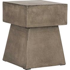 the concrete side table is made from cement blocks