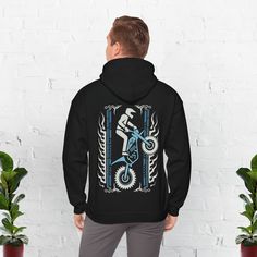 Motocross Hoodie, Dirt Bike Shirt, Motocross Shirt, Motorcross Shirt, Race Life Shirt, Off Road Hoodie, Motocross Biker Tops, Moto Hoodie. Rev up your style with our Motocross Hoodie, the ultimate dirt bike shirt for enthusiasts who live for the thrill of the ride! Whether you're tearing up the track or just hanging out with fellow riders, this hoodie is designed to keep you comfortable and looking cool. Ideal for gifting, this motocross shirt is a hit among dirt bike riders, motocross racers, and fans. It's perfect for birthdays, holidays, or just because. Get ready to embrace the motocross lifestyle with a hoodie that's as dynamic and adventurous as you are. Order yours today and hit the track in style! This heavy blend hooded sweatshirt is relaxation itself. Made with a thick blend of c Winter Biker Hoodie, Biker Style Hoodie For Streetwear, Black Biker Hoodie For Streetwear, Black Biker Style Streetwear Hoodie, Black Biker Style Hoodie, Biker Style Long Sleeve Hoodie For Streetwear, Motocross Shirts, Dirt Bike Shirts, Motocross Racer