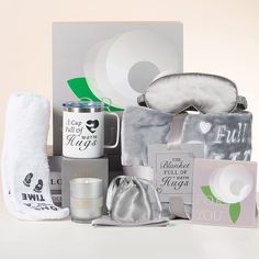 an assortment of personal care items including eye mask, travel bag, and other items