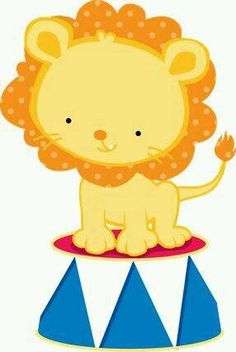 a cute little lion sitting on top of a circus ring with his paw in the air