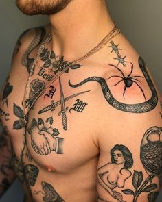 a man with many tattoos on his chest