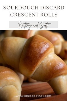 some bread rolls are stacked on top of each other with the words sourdough discard crescent rolls buttery and soft