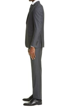 Finely textured virgin wool defines a modern-cut suit framed with crisp, handsome notch lapels. Style Name:Emporio Armani Trim Fit Solid Wool Suit. Style Number: 5470383. Trim Fit, Suit Style, Wool Suit, Emporio Armani, Flap Pocket, Welt Pocket, Perfect Fit, Nordstrom, Trousers