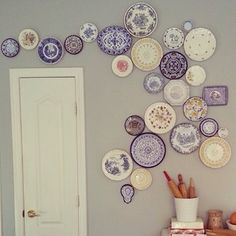 an instagram page with plates hanging on the wall