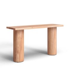 a wooden bench sitting on top of a white floor