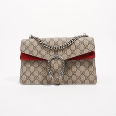 Introducing the Gucci Women's Dionysus Shoulder Bag Small - Elevate your style with this exquisite piece of luxury craftsmanship. Crafted with precision and attention to detail, this bag is a testament to Gucci's commitment to elegance and sophistication. Key Features: Iconic GG Supreme canvas with textured tiger head closure Hand-painted edges and hand-stitched finishes Sliding chain strap for versatile carrying options: single or double strap Suede lining with interior pocket for organization Gucci Style, Interior Colour, Tiger Head, Red Interior, Gucci Fashion, Red Interiors, Double Chain, Essential Bag, Timeless Accessories