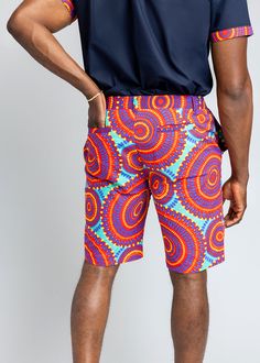 Style#M4004TRC Celebrate summer with our Debare Men's African Print Shorts in Turquoise Red Circles. "Debare," meaning "born during joyful times," perfectly encapsulates the essence of these shorts, designed in breathable all-cotton Ankara for peak summertime comfort. Explore matching outfits here. *Disclaimer* Please refer to the fabric image for the true color of this product. Features: 2 Pockets at Sides and Back 100% Cotton Ankara Fabric 10" inseam Designed in the USA, Imported Care Instruct African Print Shorts, Ankara Fabric, Print Shorts, Mens Fall, Workout Accessories, Printed Bags, Swimwear Accessories, Womens Fall, Matching Outfits