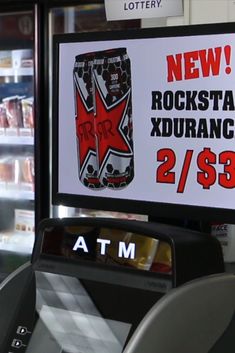 a sign advertising rock'n'roll on the front of a vending machine