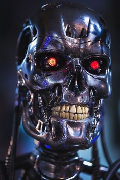 a close up of a robot with red eyes