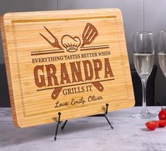 a wooden sign that says, everything tastes better when grandpa grills it