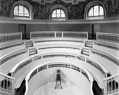 the interior of an old building with multiple balconies