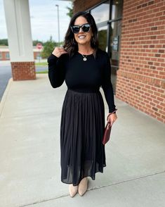 Make a statement in the gorgeous Megan Ribbed Long Sleeve Pleated Midi Dress. Made to steal the show, this dress features a classic black color that's sure to complement any complexion. The contrast ribbed knit offers a unique texture and a comfortable fit, perfect for both day and night wear. Long sleeves with the beautiful pleated skirt adds a dash of elegance to your look. Additionally, the dress comes with a skirt lining, providing extra support and a seamless silhouette. Material: 95% Rayon Skirt Lining, Night Wear, Pleated Midi Dress, Day And Night, Pleated Dress, Nightwear, Pleated Skirt, Classic Black, Ribbed Knit