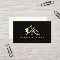 a business card with the name martin williams construction management on it and a pen next to it