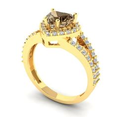 a yellow gold engagement ring with brown and white diamonds