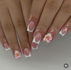 This elegant nail design features a classic French tip with a modern twist. The nails are finished with a glossy, nude-pink base and highlighted by crisp white tips that add a fresh, chic touch. One nail on each hand is adorned with a delicate 3D flower in soft pink and white, complete with a yellow center, making it a standout detail. Perfect for a sophisticated, feminine look, this style is great for any occasion, from casual outings to formal events.  #FrenchTipNails #3DNailArt #FlowerNailDesign #GlossyNails #NailInspo #NailArtDesign #ChicNails #ElegantNails #FrenchManicure #ClassyNails #pinterestnails Short White French Tip, Elegant French Tip Nails, White French Tip Acrylic, Short French Tip, Classic French Tip, Almond Acrylic Nails Designs, Henna Nails, Short French, Hard Nails