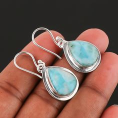 ".Natural Larimar Gemstone Earring-Sterling Silver Earrings-Minimalist Earring-12x16mm Teardrop Larimar-Handmade Dangle Earring-Gift for Her :Welcome To Store:- Metal             :-    Sterling Silver Total Weight  :-    5 Gram Over Main Stone    :-    Natural Larimar    12mm/16mm Color              :-    Silver Type               :-    Erring's Metal Purity   :-    925 Theme:Angels, Beach, Beauty, Biker Occasion:Anniversary, Birthday, Christening, Christmas, Confirmation/Communion, Engagement, Father's Day, Graduation, Mother's Day, Valentine's Day                                                  -:Shipping Handling:- Handling Time:- We take handling time of 2 to 3 Business Day from the date of receipt of the payment after receiving cleared payment. Shipping Services:- We use Standard Shi Larimar Dangle Earrings As Gift, Silver Teardrop Larimar Jewelry, Silver Larimar Dangle Earrings, Adjustable Blue Larimar Jewelry, Nickel-free Larimar Silver Jewelry, Larimar Earrings, Earrings Handmade Dangle, Minimalist Earrings, Earring Gifts