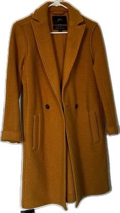 Yellow Winter Outerwear With Button Closure, Casual Yellow Outerwear For Fall, Yellow Winter Outerwear For Cold Weather, Classic Yellow Outerwear With Lapel Collar, Yellow Long Coat For Winter, Yellow Winter Outerwear For Work, Yellow Winter Workwear Outerwear, Casual Yellow Single Breasted Outerwear, Casual Yellow Single-breasted Outerwear