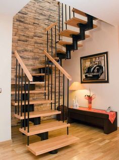 there is a wooden stair case in the house