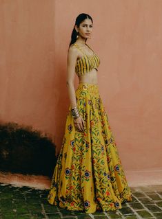 Exquisite dupion silk, lehenga with a vibrant yellow mix print and an embroidered waistband, paired with a printed, embroidered blouse and a delicate embroidered organza dupatta. Kalamkari Print, Lehenga Pattern, Printed Lehenga, Padded Blouse, Embroidered Organza, Lehenga Blouse, Dupion Silk, Yellow Blouse, Organza Dupatta