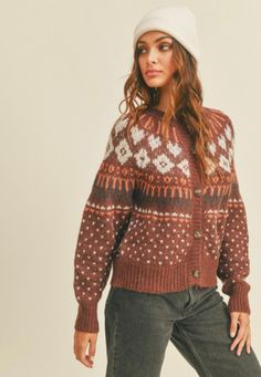 -Fair Isle Sweater -Crew Neck -Button Closure -Relaxed Fit -55% Acrylic 24% Nylon 15% Polyester 6% Wool -Dry Clean Size Chart Small Medium Large Bust 36 38 40 Waist 36 38 40 Length 22 23 24 **in inches** We can think of nothing better than relaxing in a cozy cabin with a warm fire in the hearth. This fall and winter our fireside sweater is just the piece you need for a cozy core style. This classic fair isle cardigan sweater is in the prettiest deep Mahagony color and is perfect with a pair of l Cozy Cabin Outfit, Cabin Sweater, Cabin Outfit, Cozy Core, Icelandic Wool Sweaters, Teacher Clothes, Fair Isle Cardigan, Fall Clothes, Teacher Outfits