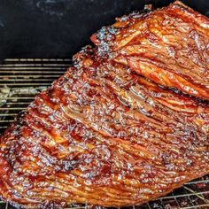 the steak is cooking on the grill and ready to be cooked in the oven,