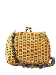 camel yellow woven wicker design top clasp fastening single beaded top handle main compartment This piece comes complete with a protective dust bag. Rectangular Straw Bag With Bamboo Handle For Evening, Evening Rectangular Straw Bag With Bamboo Handle, Brown Woven Straw Bag For Evening, Wicker Clutch, Single Bead, Chanel 2, Iconic Bags, Beaded Top, Summer Beach Wear