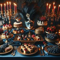 a table topped with lots of cakes and desserts