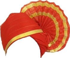 a red and yellow fan with gold stripes on it's side, sitting in front of a white background