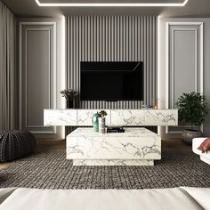 a living room with white furniture and a flat screen tv mounted on the wall above it