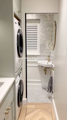 a washer and dryer in a small bathroom