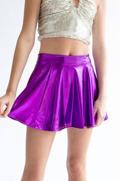 Metallic skater skirt, available in 5 colors. Customers also love our metallic leggings Metallic Stretch Skirt, Solid Shiny Bottoms For Party, Shiny Solid Color Bottoms For Party, Shiny Solid Color Party Bottoms, Solid Shiny Party Bottoms, Metallic Stretch Skirt For Party, Metallic Stretch Skirt For Night Out, Trendy Mini Tennis Skirt For Party, Shiny Stretch Mini Skirt